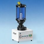 Compact desktop powder feeder with agitation system and low-powder alarm for laser cladding applications