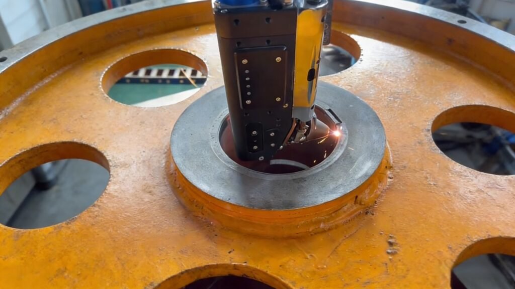 Laser cladding head processing inner bore of pulley using coaxial powder deposition system