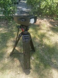 Remote 12kW High Power Laser Output Module mounted on tripod