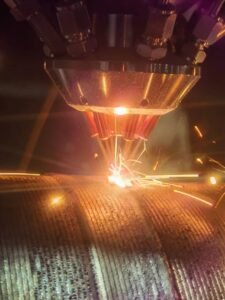 laser cladding process using 6-jet coaxial powder feeding laser cladding head